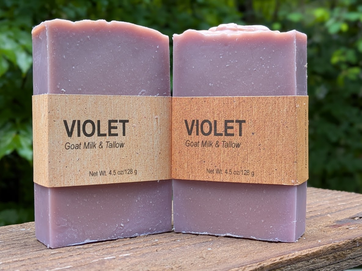 Two bars of our violet soap standing on end.