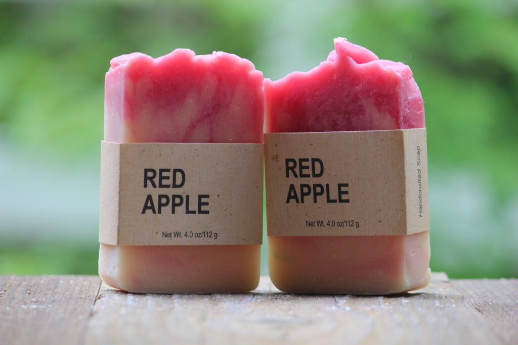 Two bars of apple-scented soap.